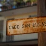 Rusted public street sign of Cabo San Lucas.